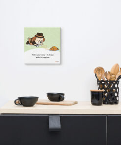 Cute beagle illustration dressed as a detective sniffing a croissant with the quote “Follow your nose – it always leads to happiness.”